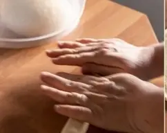 Step <p>Forma un cilindro largo con el mazapán, del tamaño de la parte mas larga del rectángulo de la masa.</p><p><br></p> illustration