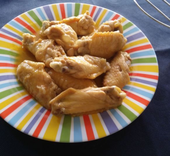 Alitas de pollo con cebolleta al curry